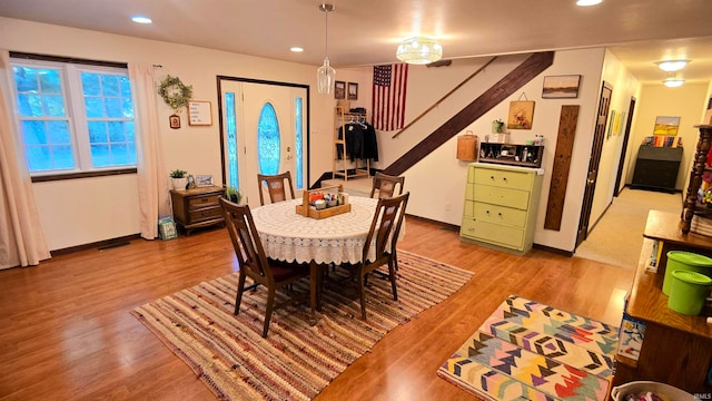 dining area with light hardwood / wood-style floors