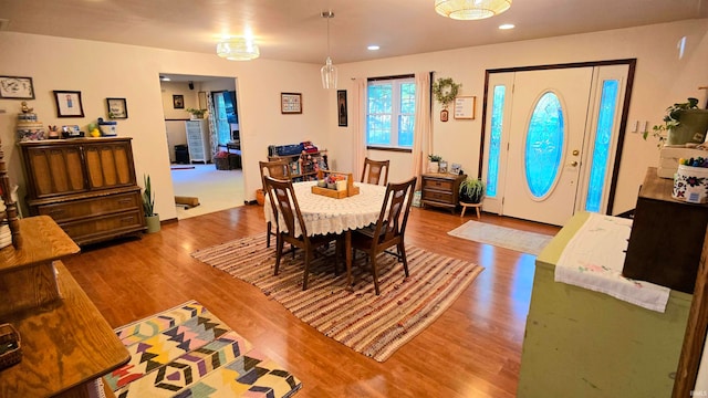 dining room with hardwood / wood-style flooring