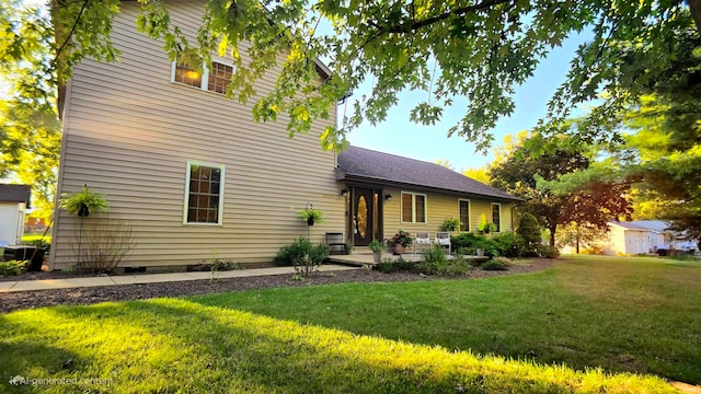 exterior space with a yard and central AC