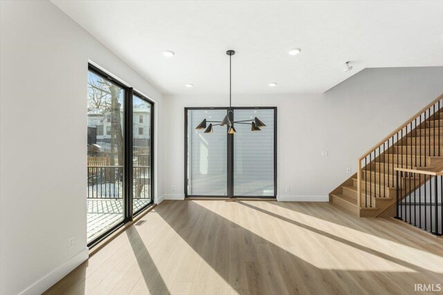 kitchen featuring brown cabinetry, modern cabinets, white appliances, and open shelves