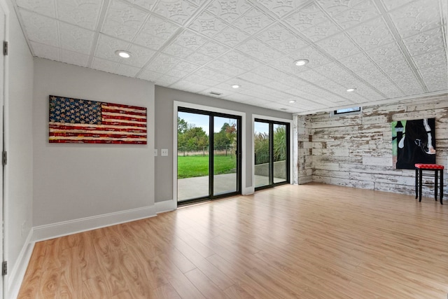 spare room featuring light hardwood / wood-style floors