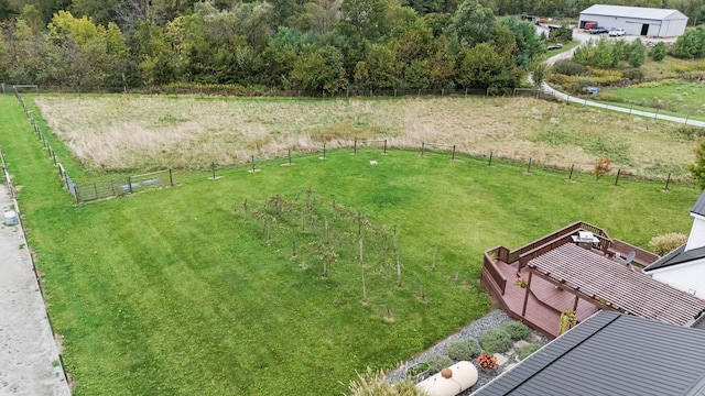 view of yard with a rural view