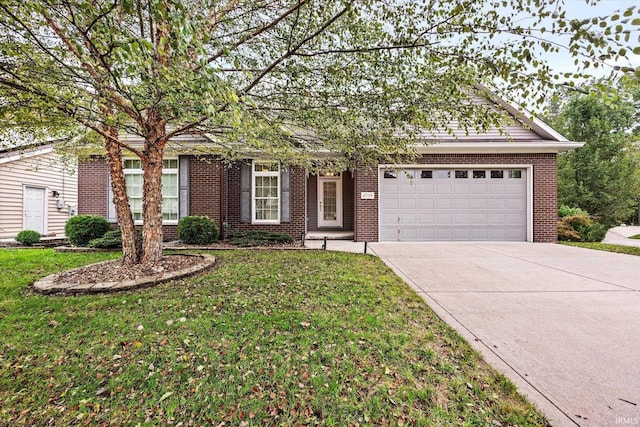 single story home featuring brick siding, an attached garage, a front lawn, and concrete driveway
