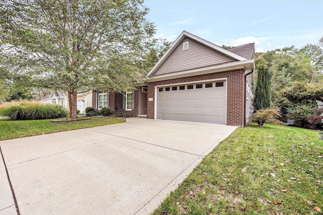 view of front of property featuring a garage and a front lawn