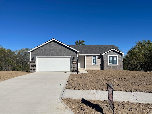 single story home with a garage