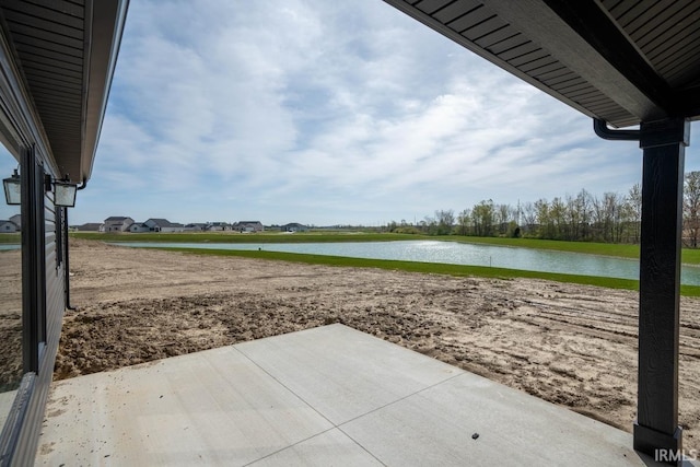 view of patio / terrace with a water view