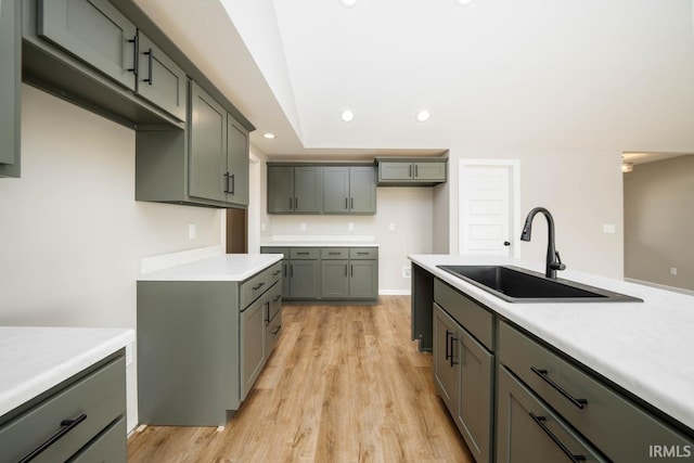 926 Lagonda Trl, Fort Wayne, IN 46818 - kitchen featuring a sink, light wood-style flooring, recessed lighting, and light countertops