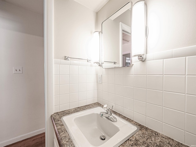 bathroom featuring vanity and hardwood / wood-style flooring