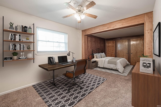 bedroom featuring light carpet and ceiling fan