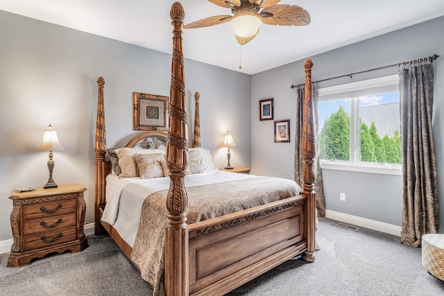 bedroom with ceiling fan and carpet flooring