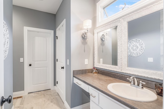 bathroom featuring vanity