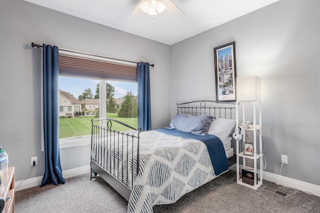 bedroom featuring ceiling fan and carpet flooring