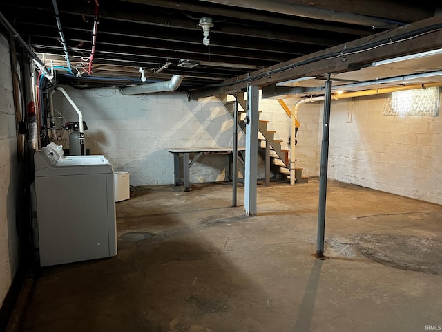 basement featuring separate washer and dryer