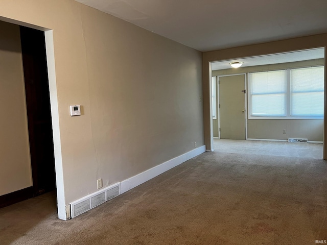 unfurnished room with carpet