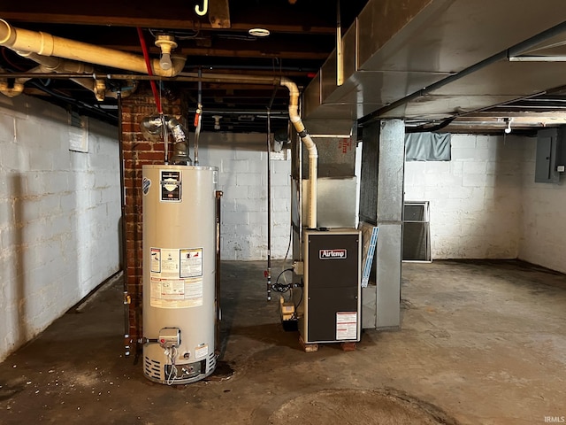 utility room with gas water heater, electric panel, and heating unit