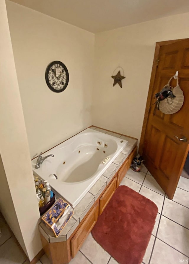 bathroom featuring a bathtub and tile patterned floors