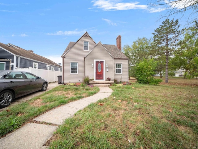 view of front of property with a front lawn