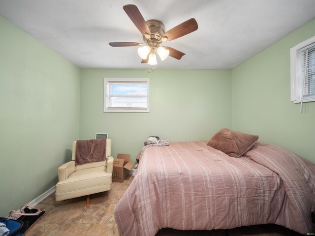 bedroom featuring ceiling fan