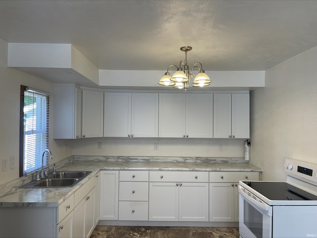 kitchen with white electric range, decorative light fixtures, sink, and white cabinetry