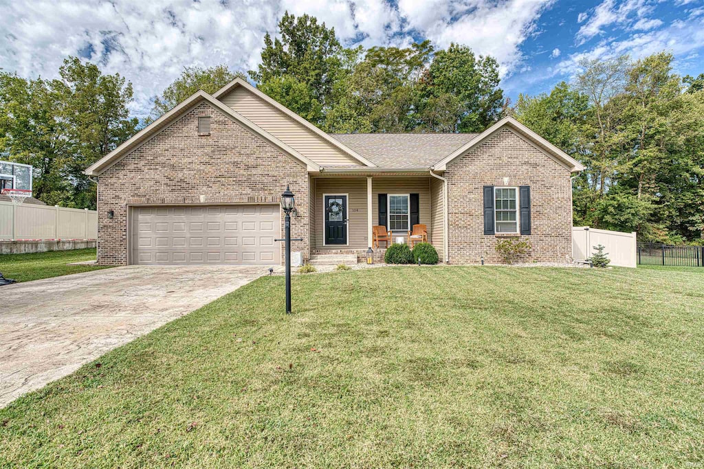 view of front facade featuring a front yard and a garage