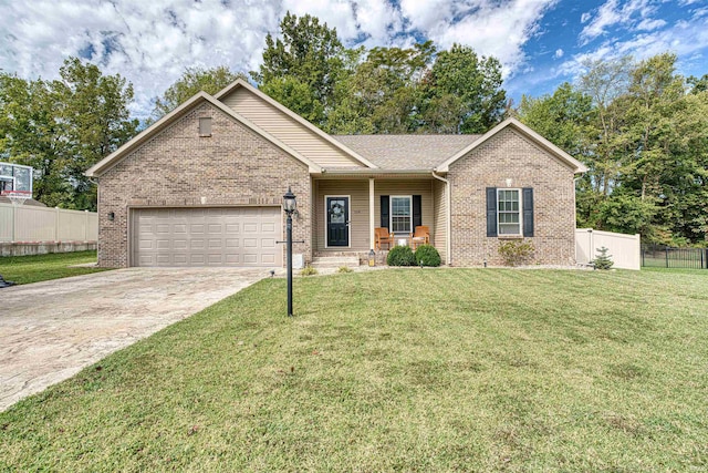 view of front facade featuring a front yard and a garage