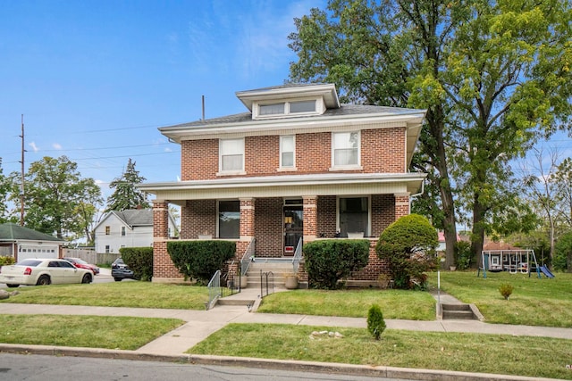 view of front facade featuring a front yard, a playground, and covered porch