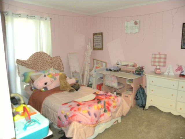 carpeted bedroom featuring crown molding