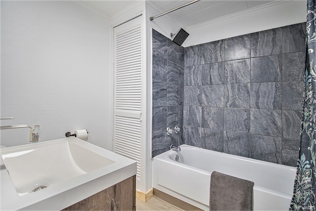 bathroom with ornamental molding, hardwood / wood-style flooring, and shower / bath combo with shower curtain