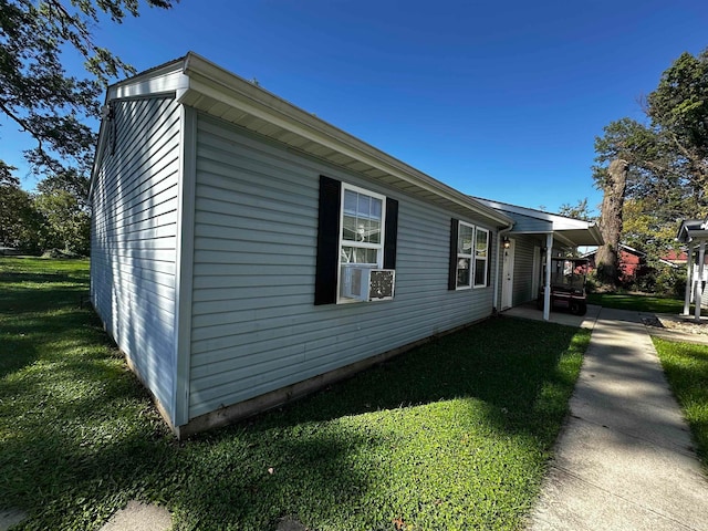 view of home's exterior featuring a lawn