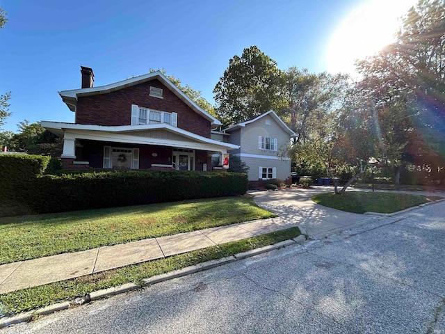 view of front of home with a front yard