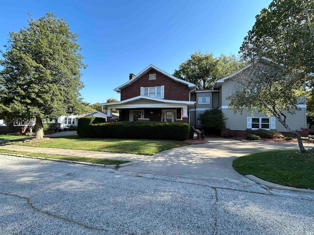 view of front of house with a front lawn