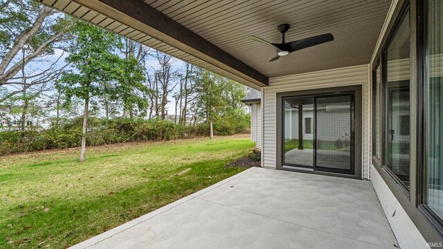 view of patio featuring ceiling fan