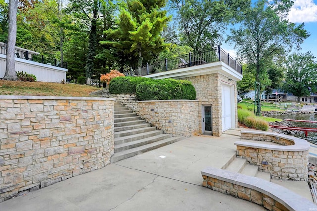 view of patio featuring a garage