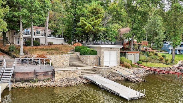 view of dock with a water view