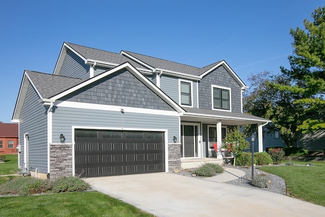 craftsman-style home with a front yard and a porch