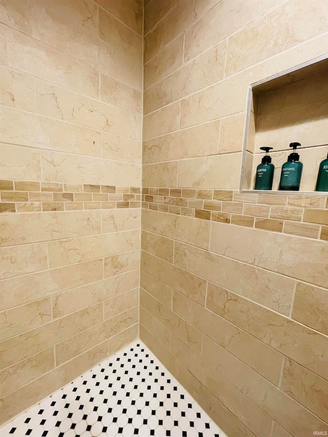 bathroom featuring a shower