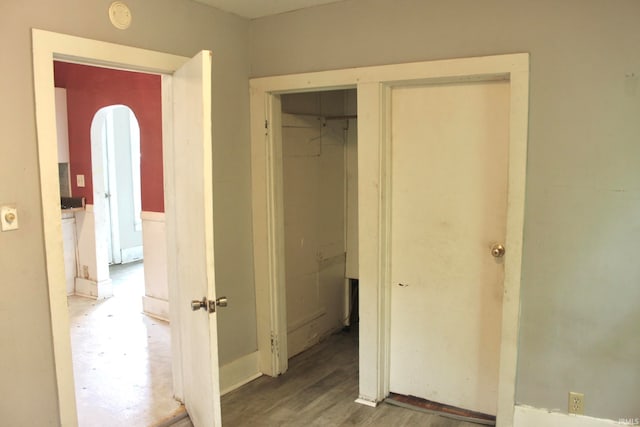 hallway featuring hardwood / wood-style flooring