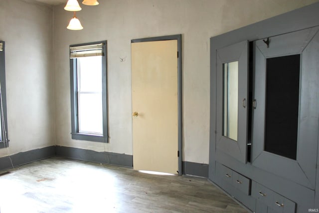 spare room featuring hardwood / wood-style flooring