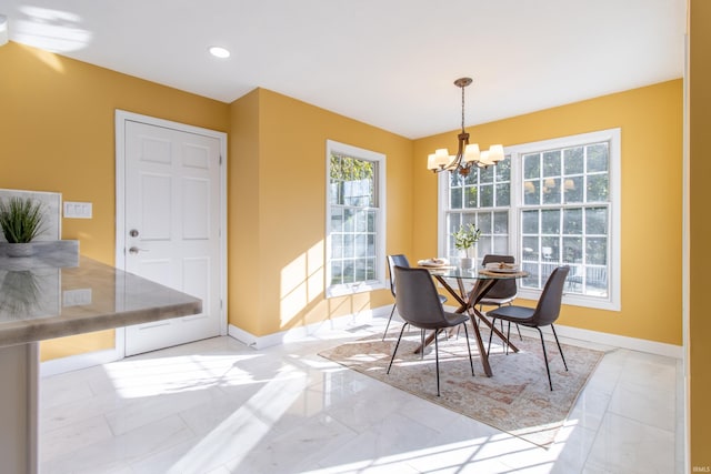 dining room featuring a chandelier