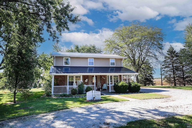 view of front of house featuring a front lawn and a porch