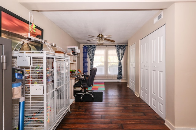 office space with dark hardwood / wood-style flooring and ceiling fan