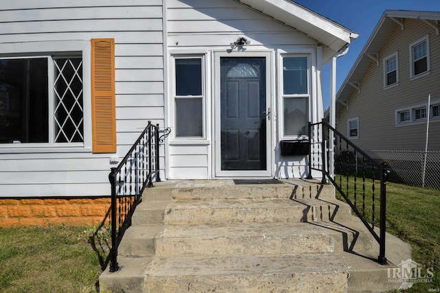 property entrance featuring cooling unit