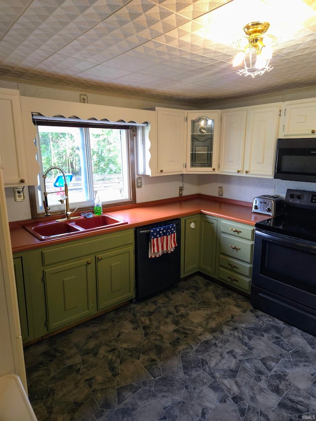 kitchen featuring white cabinets, green cabinetry, sink, and black appliances