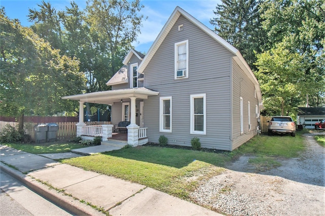 view of front facade featuring a porch and a front yard