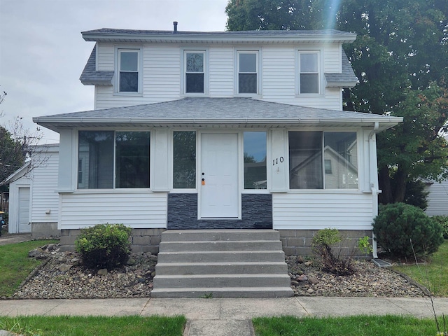 view of front facade featuring a sunroom