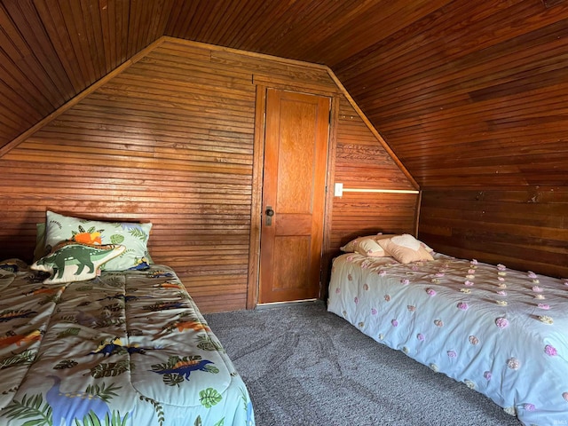 unfurnished bedroom with carpet, wood ceiling, wood walls, and lofted ceiling