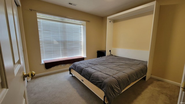 bedroom featuring carpet