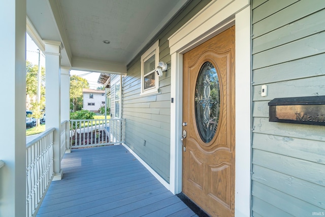 property entrance with a porch