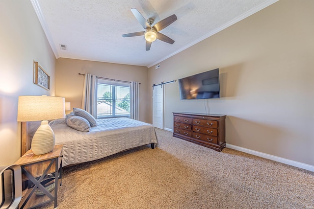 carpeted bedroom with ornamental molding, vaulted ceiling, ceiling fan, and a textured ceiling