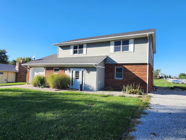 front facade featuring a front lawn